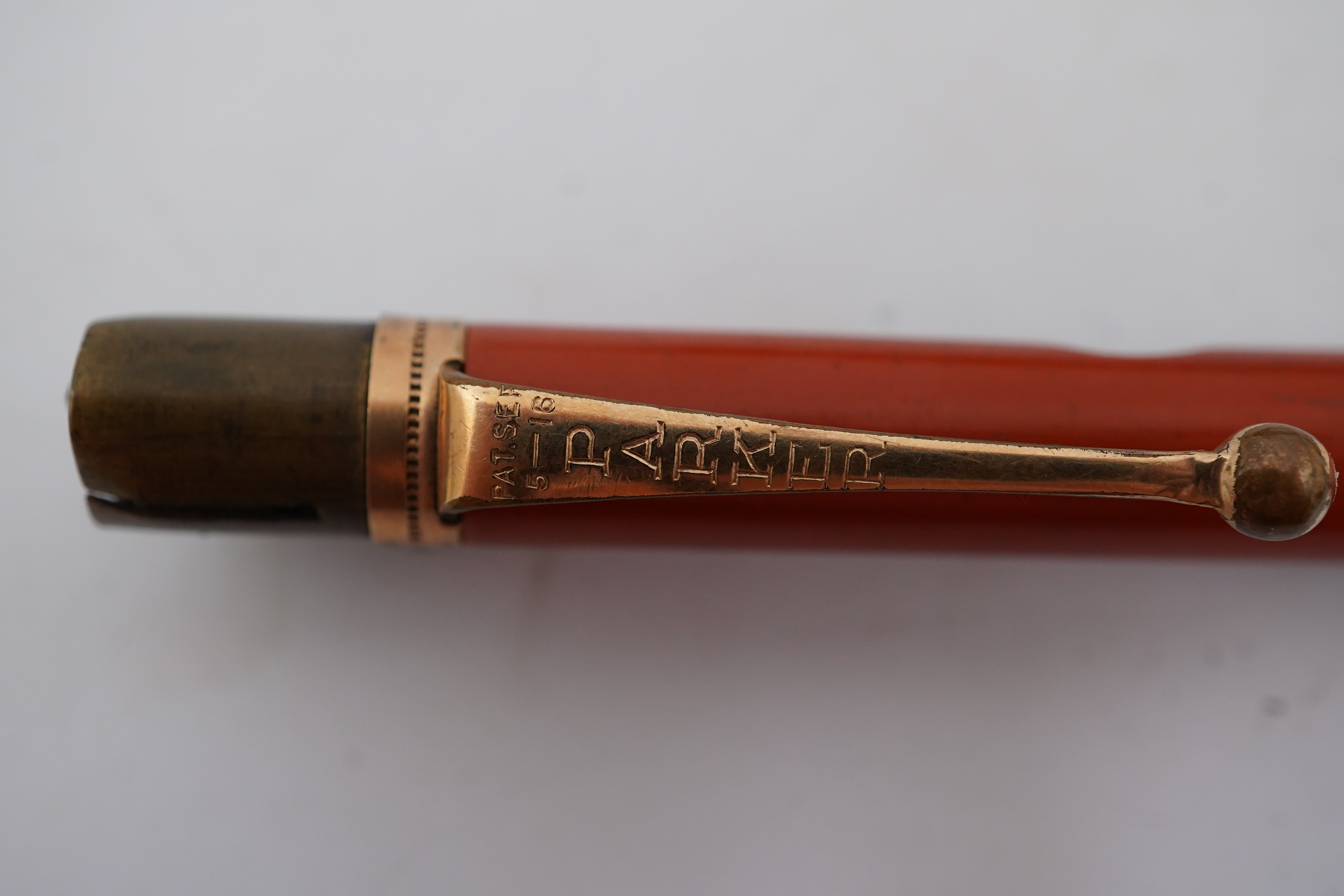 A Parker Duofold Lucky Curve fountain pen, and matching propelling pencil. Condition - poor